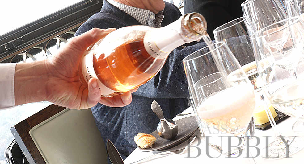 Pouring rose sparkling wine ruggeri prosecco doc