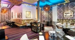 Enjoy a Glass of Bubbly at Purnell’s Michelin-Starred Restaurant