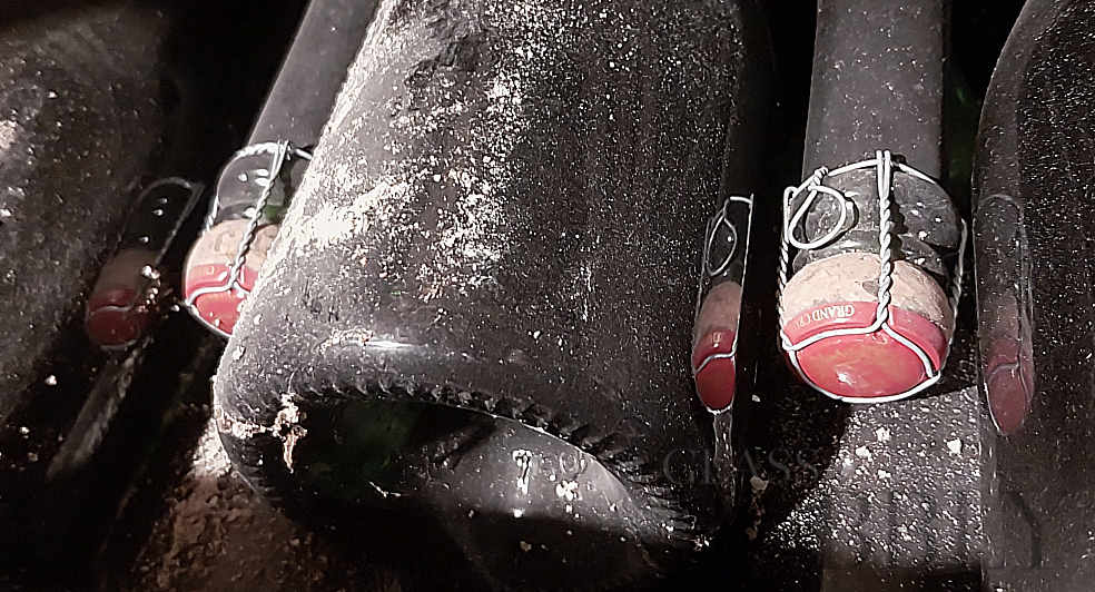 stored champagne bottles crand cru cellar