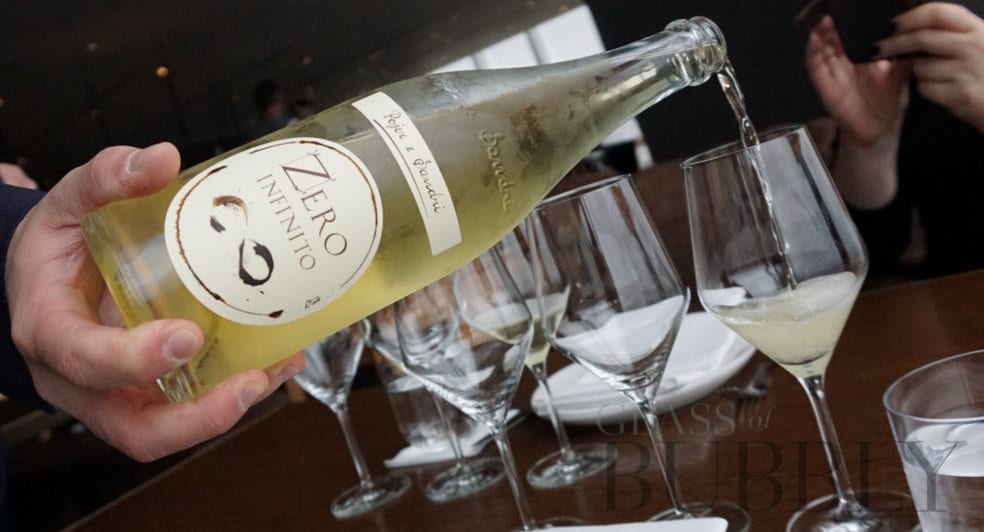 Pouring Pétillant Naturel sparkling wine