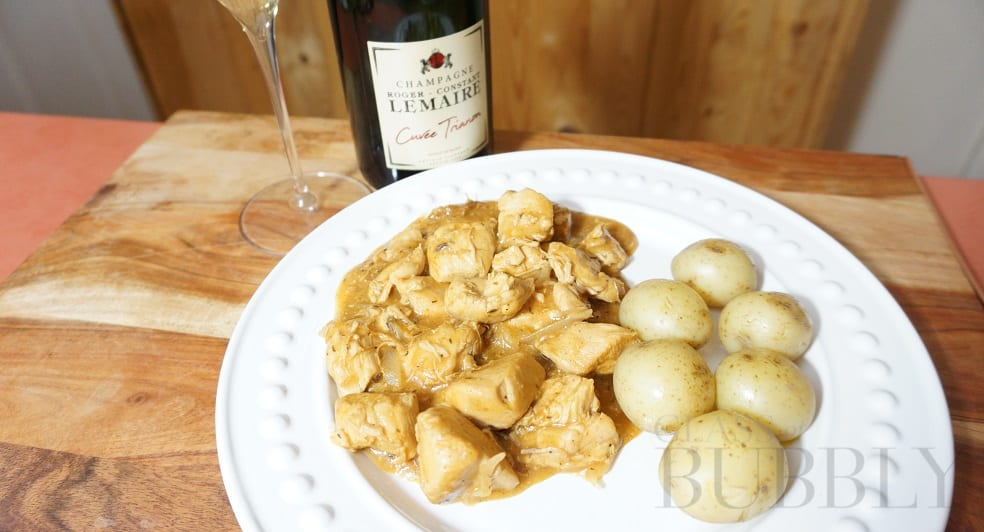 Coq Au Vin Blanc with a glass of Roger Constant Lemaire Champagne
