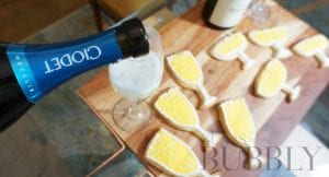 Pouring Prosecco to go with Prosecco Biscuits