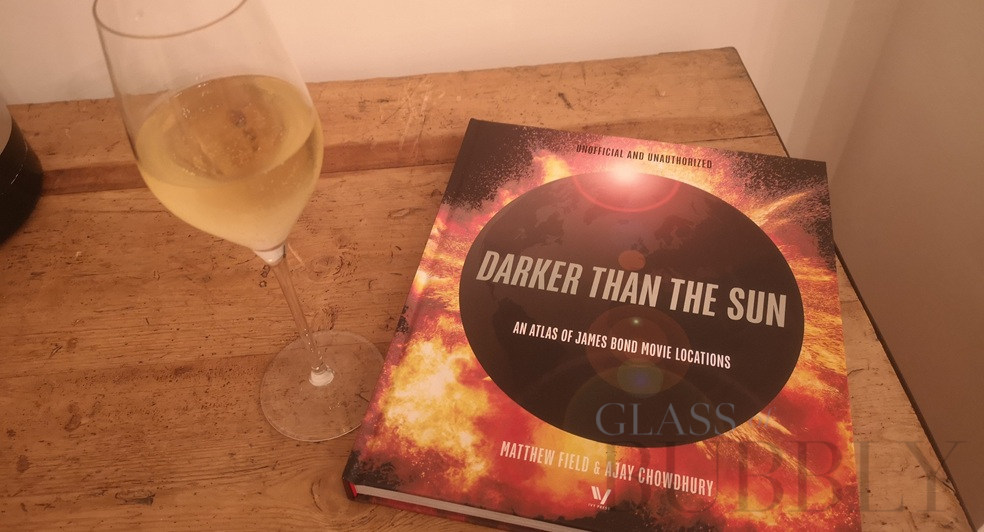 Darker than the sun book and glass